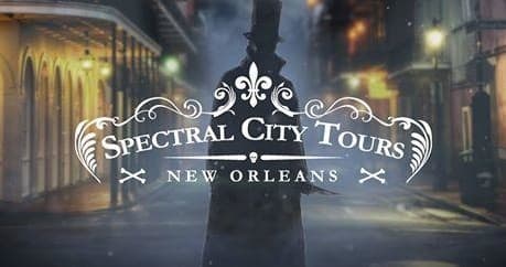 Nighttime Spectral City Tours hero banner on New Orleans street