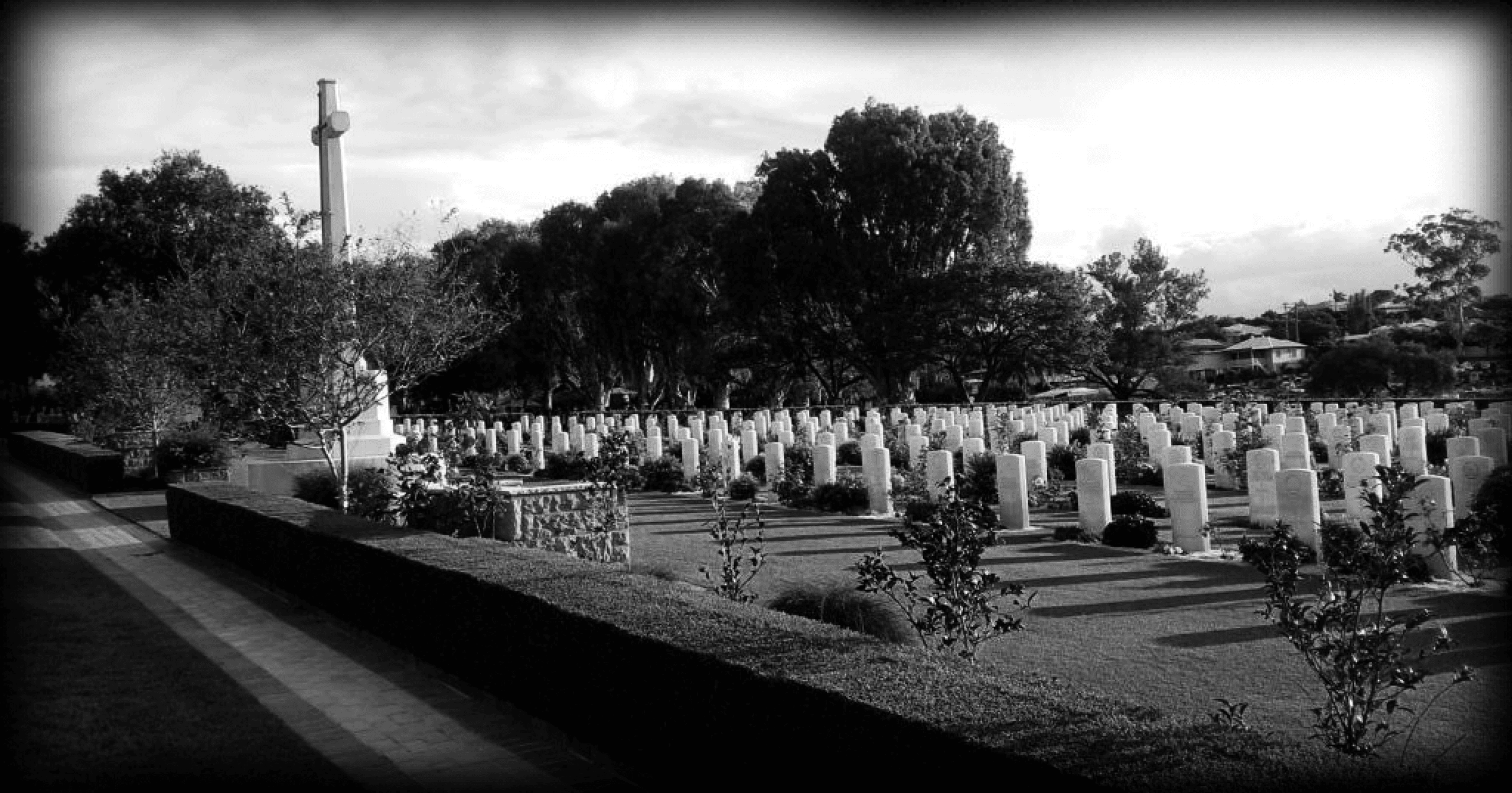 Wide cemetery panorama with monuments, guided outdoor ghost tour