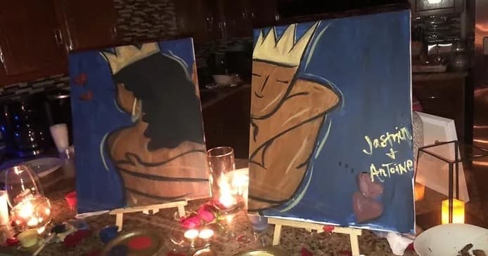 Couples painting canvases at indoor art studio with easels