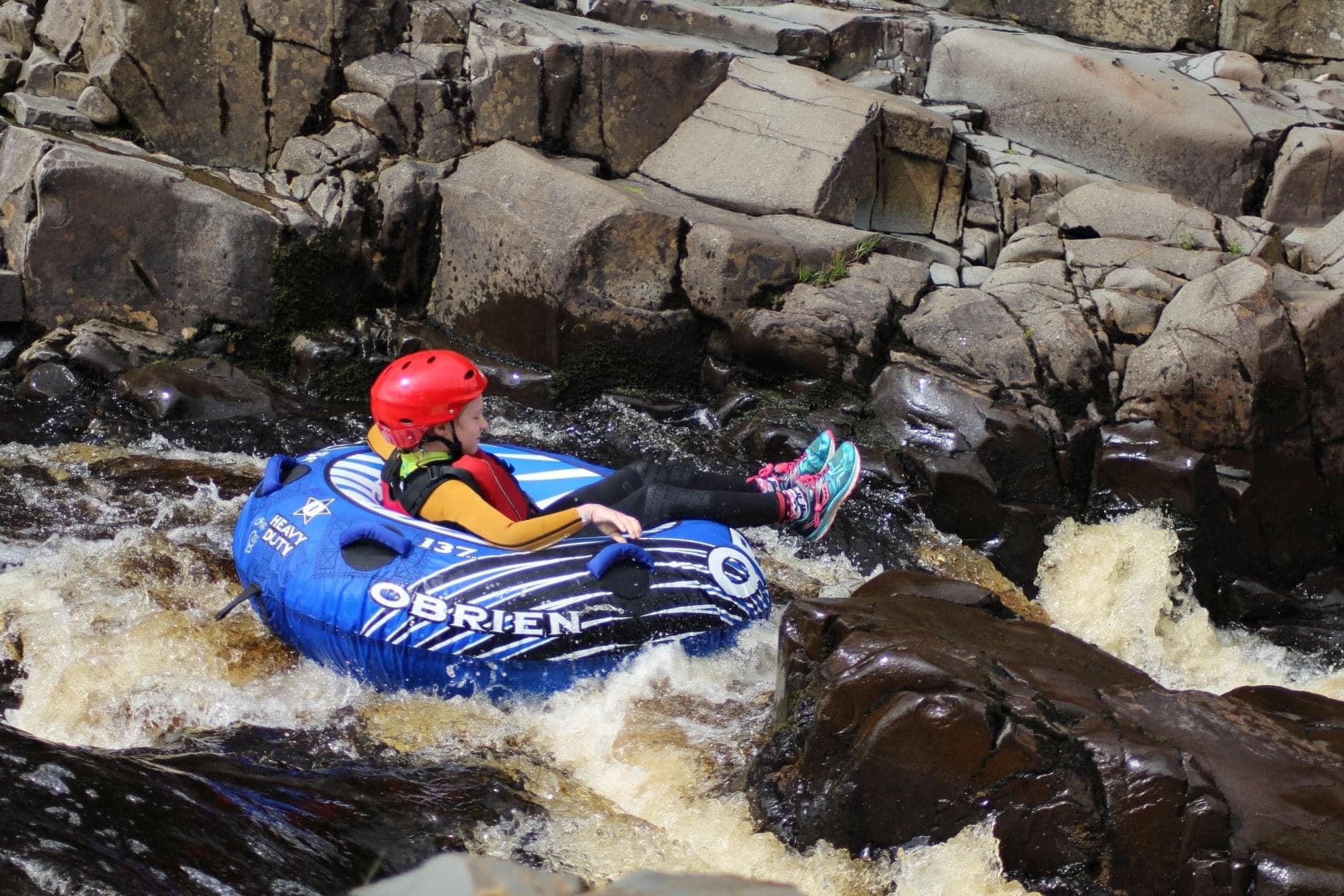 White Water Tubing Adventure at High Force Waterfall by Keswick Adventures