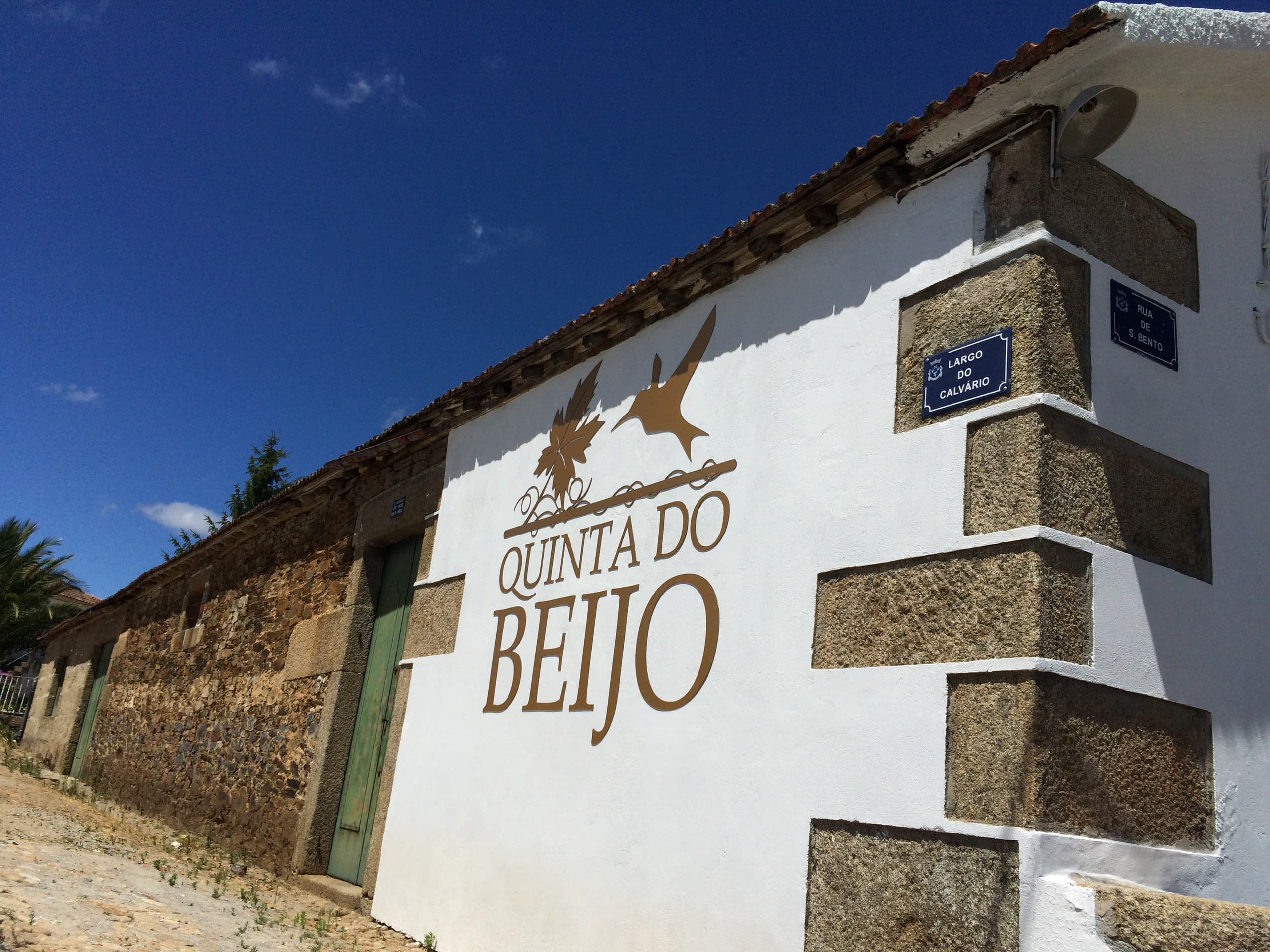 Quinta do Beijo winery facade and sign on sunny rural estate