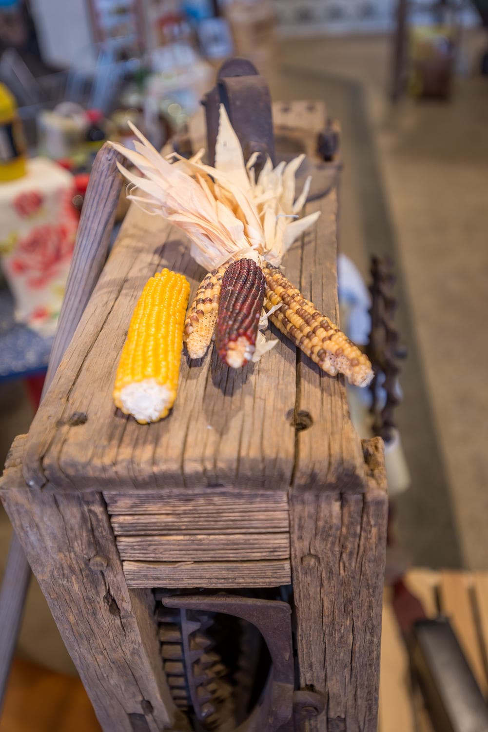 Decorative Indian corn on wooden crate at farm market stall