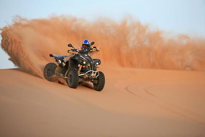Evening Dubai Desert Safari: Quad Biking, Dune Bashing & Sandboarding with BBQ