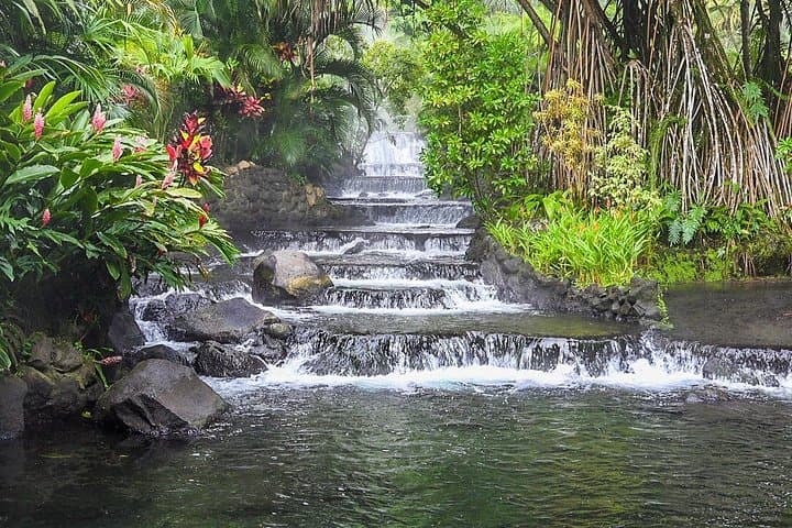Arenal Combo: Hanging Bridges, La Fortuna Waterfall, Volcano Hike & Hot Springs photo 1