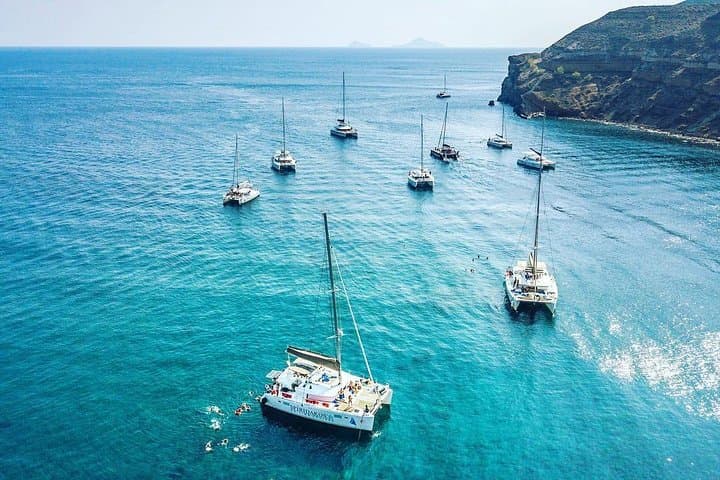 Santorini Catamaran Cruise: Caldera Views, Volcano Swim & BBQ Experience photo 3