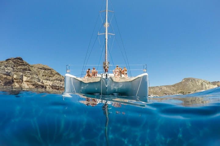 Santorini Catamaran Cruise — Caldera, Hot Springs & Red Beach (Meal + Open Bar) photo 2