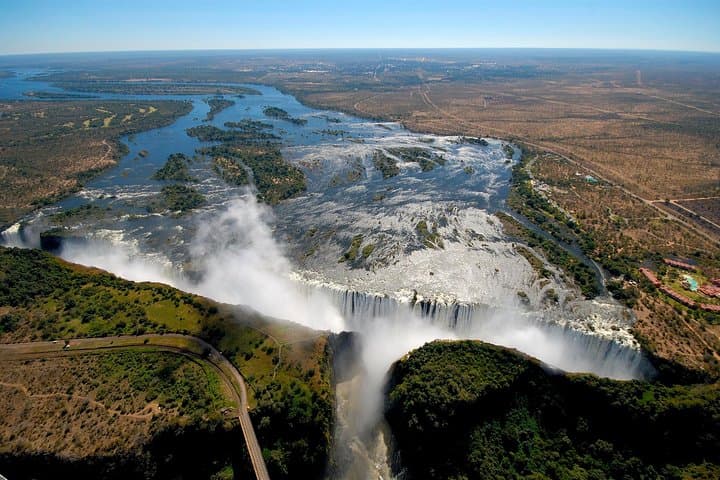 Victoria Falls Day Trip from Kasane — Silver Package: Guided Tour, Lunch & Market Visit photo 2