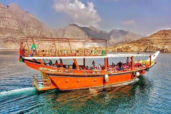 Full-Day Musandam Dibba Dhow Cruise: Snorkel, Dolphins & Buffet Lunch from Dubai