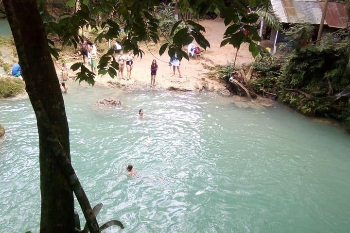 Negril to Ocho Rios: Blue Hole & Dunn's River Waterfall Adventure with Lunch and Local Markets