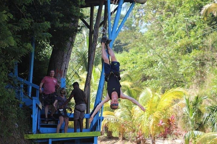 Full-Day Zipline Adventure and Private Beach Club on Roatán Island photo 1