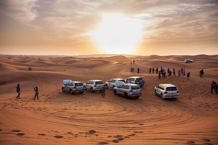 Dubai Sunset Desert Safari: Dune Bashing, Camel Ride & BBQ Camp Experience photo 2