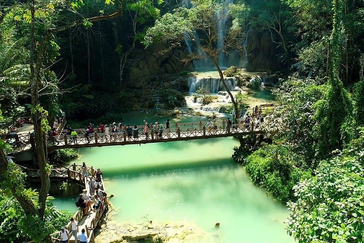 Luang Prabang City Tour and Kuang Si Falls: Temple Walks, History & Blue Pools