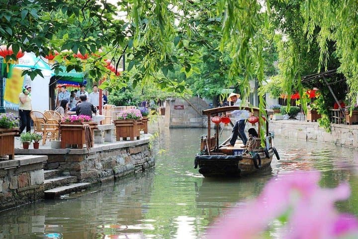 Explore Shanghai and Zhujiajiao: Private Combo Tour with Boat Ride & Tea Tasting photo 1