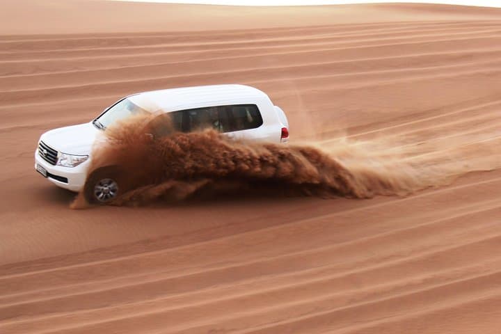 Dubai Desert Safari: Dune Bashing, Camel Rides & BBQ Bedouin Camp Experience