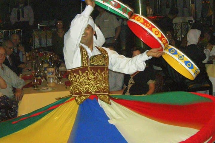Evening Nile Dinner Cruise in Cairo: Buffet, Belly Dance & City Lights