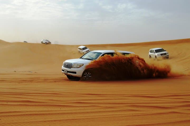 Sunrise Desert Safari in Abu Dhabi: Dawn Over Dunes & Hajar Views photo 3