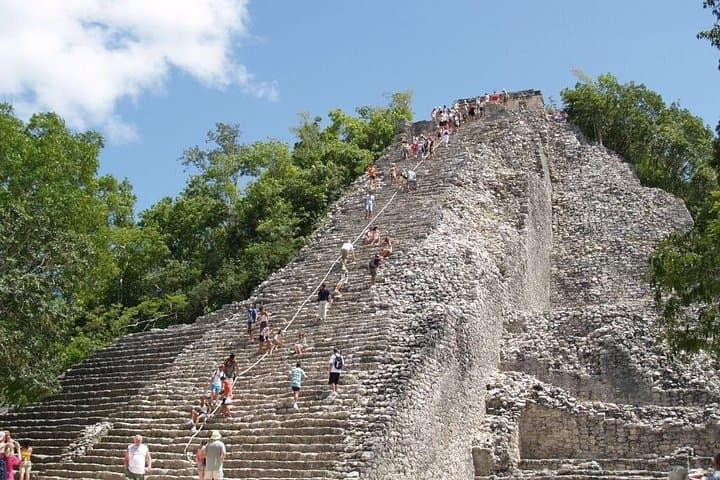 Explore Coba Ruins Full-Day Tour: Cenote Swim & Mayan Village photo 1