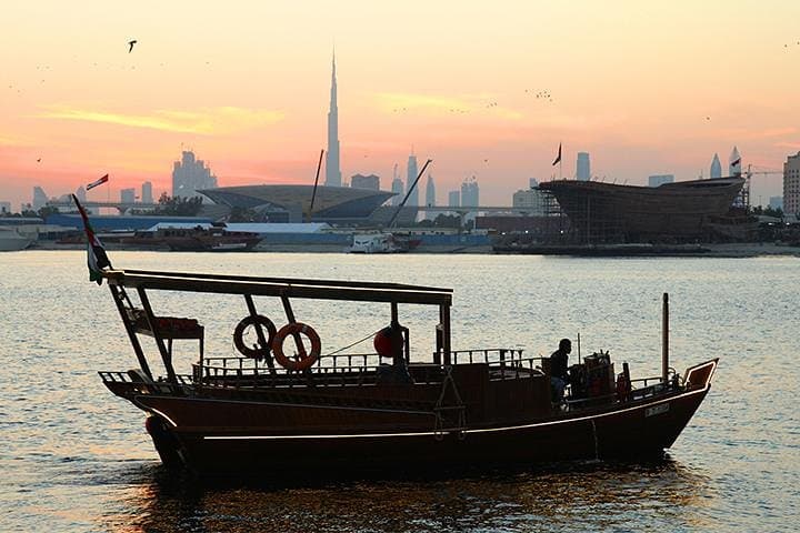 Sunset Abra Ride with Emirati High Tea on Dubai Canal — Burj Khalifa & Imagine Fountain Views