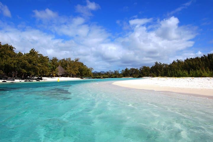 Paradise Cruise to Ile aux Cerf: Catamaran Snorkel & Waterfall Views from Trou d'Eau Douce