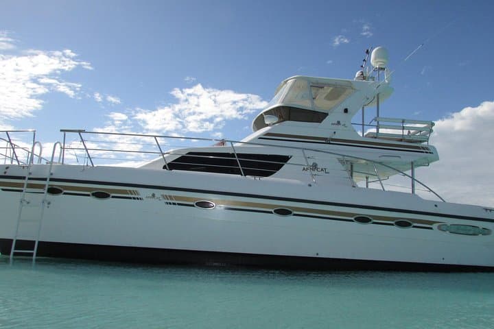 Turks and Caicos Full-Day Luxury Yacht Charter — Snorkel Grace Bay & Private Beach Stops photo 1