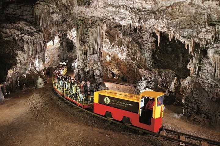 Postojna Cave & Predjama Castle Day Trip from Koper — Underground Train and Cliffside Fortress