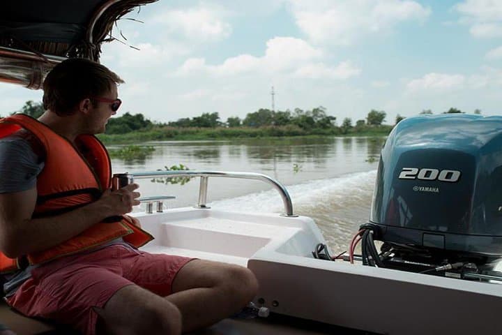 Morning Speedboat Tour of Saigon: Breakfast Cruise, Skyline & Binh Tay Market