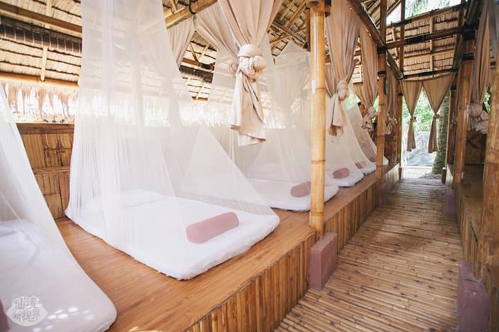 Stay in a Bamboo Hut at Tadom Hill Resort: Lakeside Swings, 5m Diving Platform & Rustic Camping