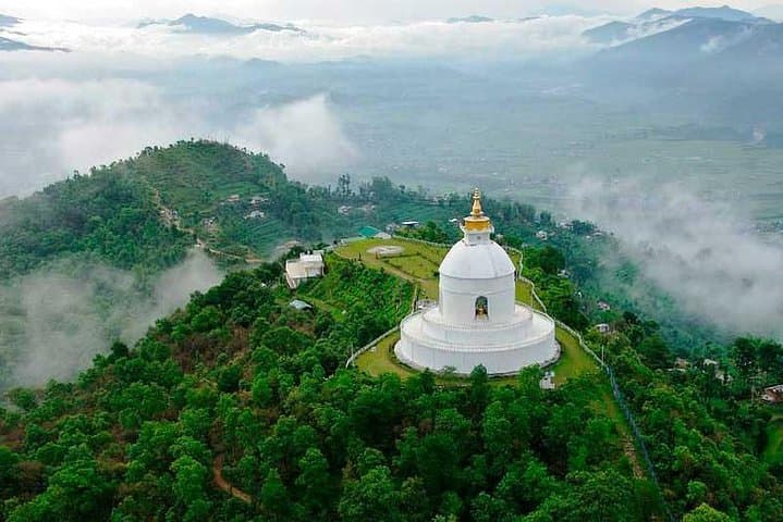 Pokhara World Peace Stupa Day Tour — Phewa Lake, Davis Fall & Gupteshwor Cave