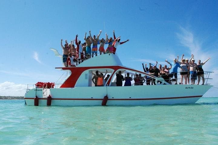 Punta Cana Party Boat & Parasailing Combo: Catamaran Cruise, Snorkel and Natural Pool Adventure