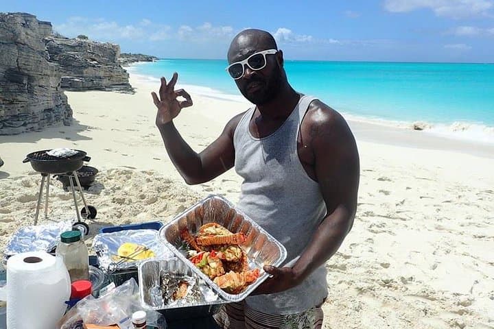 Grace Bay Private Catamaran: 7-Hour Sail, Snorkel & Beach BBQ in Providenciales
