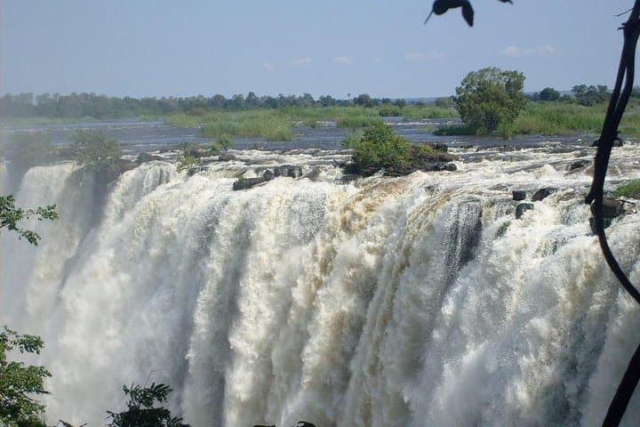 Victoria Falls Sundowner Cruise, Airport Transfer & Falls Tour Combo