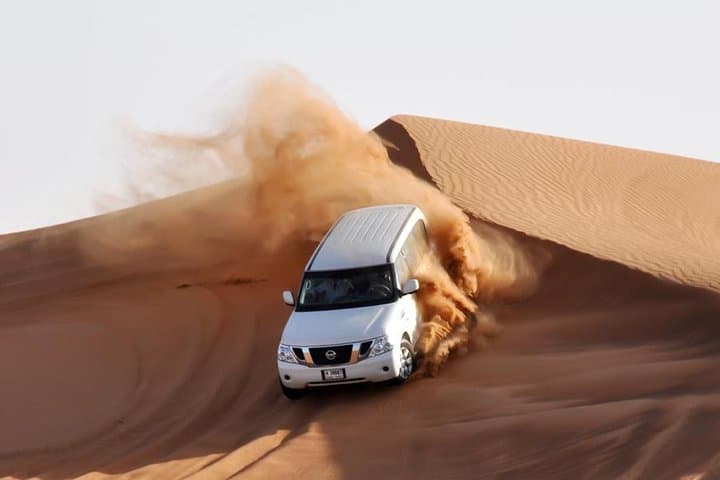 Evening Dubai Desert Safari: 4x4 Dune Bashing, Camel Ride & Premium BBQ