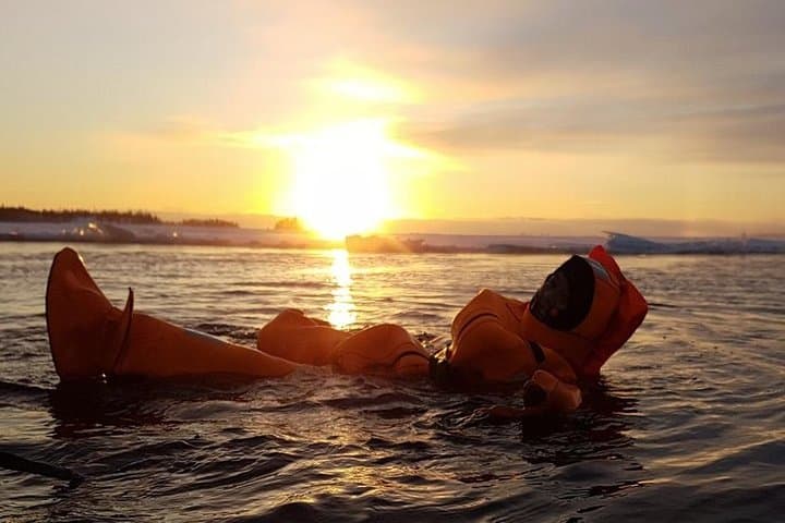 Midnight Sun Floating Experience on Forest Lake — Rovaniemi's 24-Hour Light