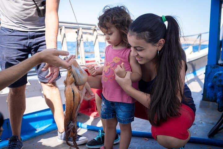 Santorini Traditional Fishing Experience: Semi-Private Boat, Snorkel & Cook Your Catch photo 2