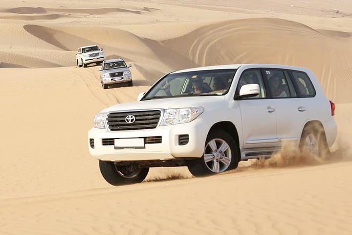 Morning Desert Safari Dubai: Camel Rides, Sandboarding & Dune Bashing