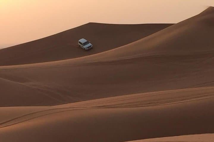 Dubai Evening Desert Safari: Dune Bashing, Bedouin Camp & BBQ Experience