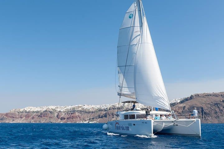 Santorini Catamaran Cruise with BBQ, Snorkeling & Hot Springs