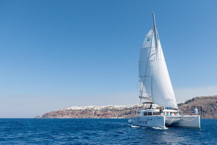 Santorini Private Lagoon 450 Catamaran Day Tour with BBQ, Snorkeling & Hot Springs photo 1