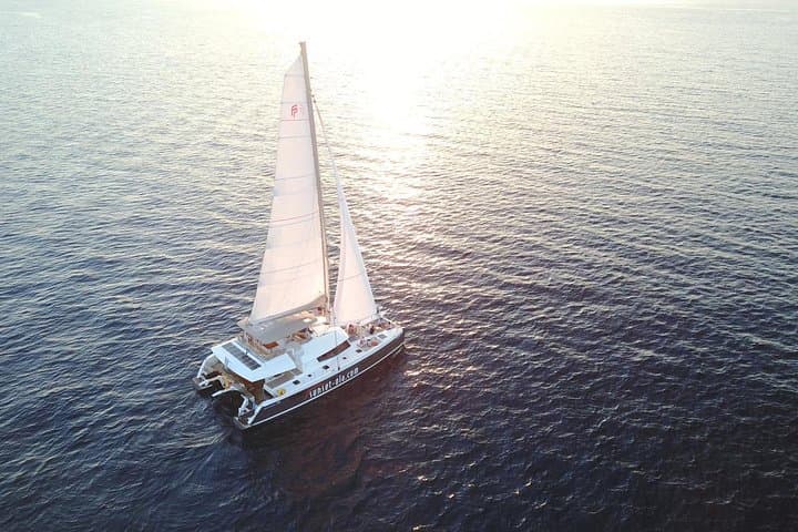 Santorini Luxury Catamaran Sunset Cruise with BBQ, Drinks & Hot Springs Swim