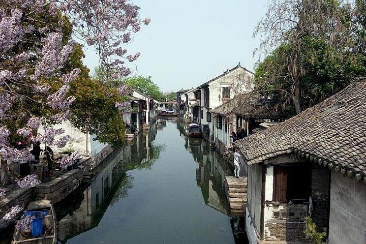 Suzhou Private Day Tour: Zhouzhuang Water Town & Panmen Garden Guide photo 1