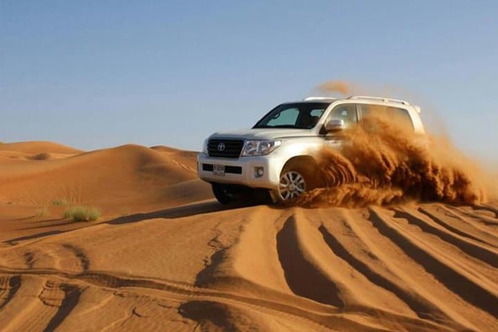 Red Dunes Dubai Desert Safari: Dune Bashing, Sandboarding & Sunset BBQ photo 4
