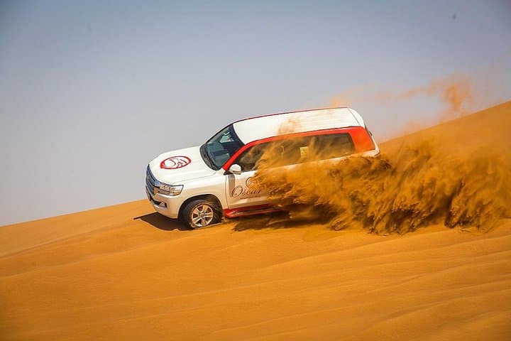 Morning Red Dunes Safari in Dubai — Dune Bashing, Sandboarding & Camel Ride photo 2