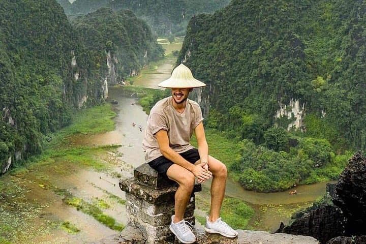 Day Trip to Trang An, Hoa Lu & Mua Cave from Hanoi — Boat Caves and Summit Views photo 6