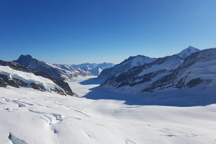 Jungfraujoch Top of Europe Private Day Trip from Basel — Eiger Express, Ice Palace & Sphinx Views photo 2