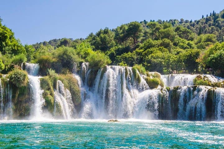 Exploring Krka Waterfalls: Scenic Boat Ride and Swimming Adventure from Split