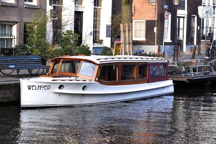 Historic Salon Boat Canal Cruise in Amsterdam: Private 2-Hour Guided Tour photo 1