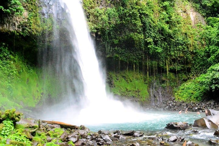 La Fortuna Full-Day: Hanging Bridges, La Fortuna Waterfall, Arenal Volcano Hike & Hot Springs photo 1