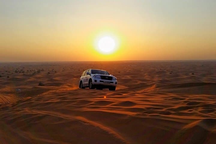 Dubai Desert Safari with Dinner, Live Show & Camel Ride — Evening Camp Experience photo 2