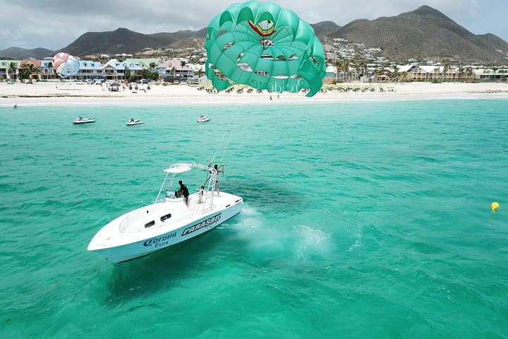 Soar Over Orient Bay: Parasailing 300 Feet Above Sint Maarten's Caribbean Beach photo 1