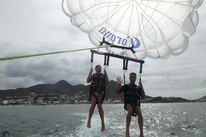 Soar Over Orient Bay: Parasailing 300 Feet Above Sint Maarten's Caribbean Beach photo 2